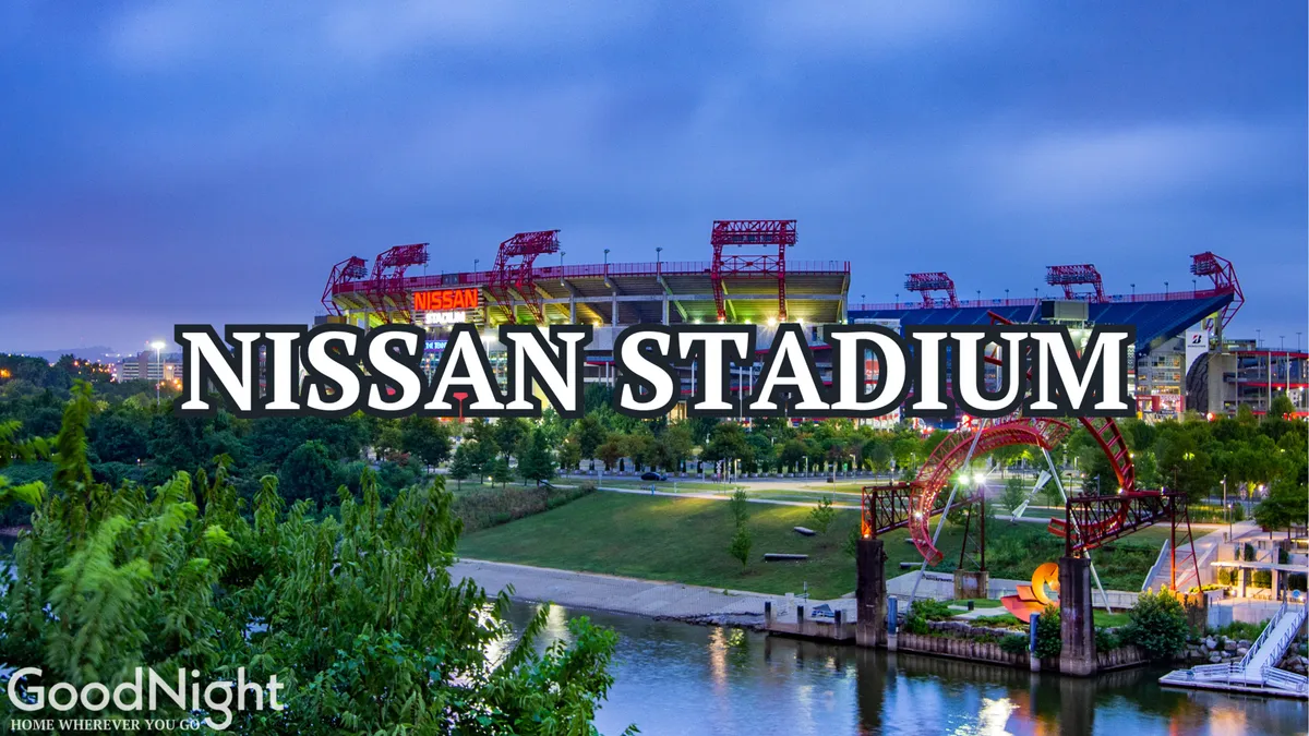An exterior view of Nissan Stadium located by the river, with an adjacent park area visible. The scene captures the excitement of major sports events with plenty of open space, trees, and the city backdrop, hinting at the property's proximity to vibrant local attractions.